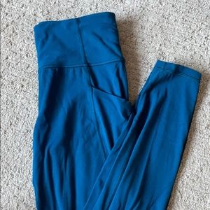 Athleta Stash Pocket Salutation Tight